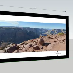 Eine Frau blickt auf ein riesiges 16:9-Display, das eine atemberaubende Aussicht auf den Grand Canyon zeigt.