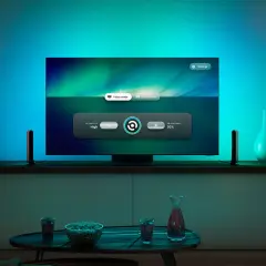 TV-Bildschirm mit der hue sync tv app, die Video- und Spielmodi anzeigt. Intensität auf "High" und Helligkeit auf 30% eingestellt.