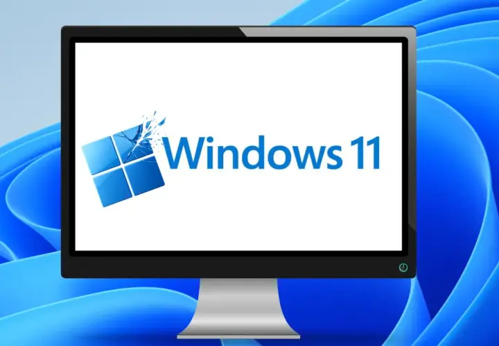 Ein Monitor zeigt das Windows 11 Logo, bereit für das Einrichten des neuen PCs.