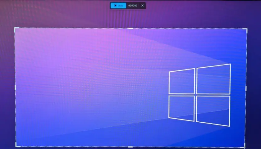 Bildschirmaufnahme von Windows 11 mit dem Start-Button und Timer. Das Fenster ist mit gestrichelten Linien markiert.