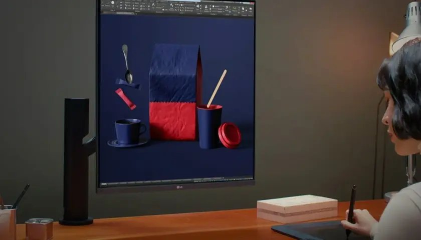 Kreative Arbeit am LG DualUp Monitor: Eine Designerin bearbeitet ein Bild von Kaffeeprodukten.