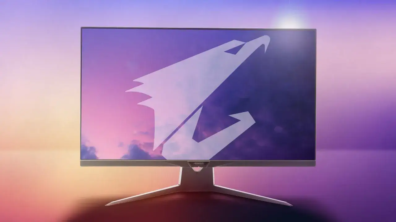 Gaming-Monitor mit AORUS-Logo vor einem farbenfrohen Himmel. Hohe FPS bedeuten fl&uuml;ssige Spiele.
